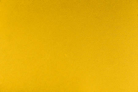 Yellow genuine cow leather of the sofa texture and background seamlessの写真素材