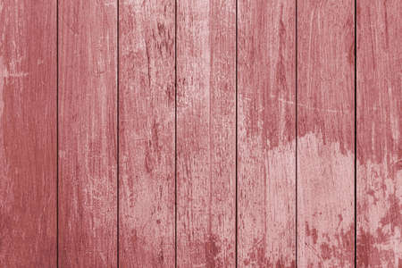 Old red wood color texture vertical for background. Surface light clean of table top view. Natural patterns for design art work and interior or exteriorの写真素材