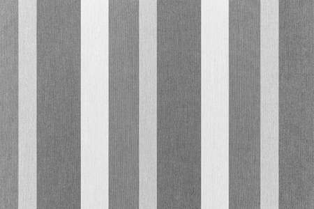 Fabric texture with white and grey stripes.  Colored embroidery pattern and background seamlessの写真素材