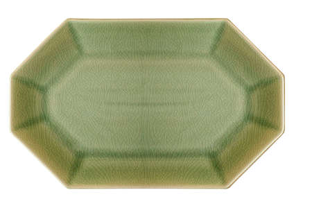Light green celadon porcelain plate isolated on a white backgroundの写真素材