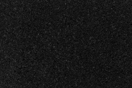 Black polished sandstone wall texture and seamless backgroundの写真素材