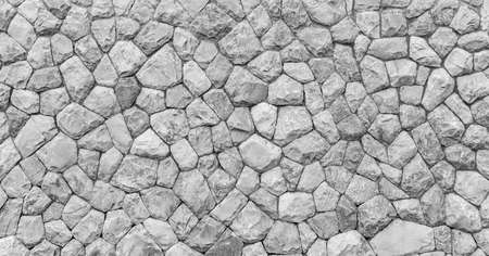 Panorama of White natural stone wall pattern and background textureの写真素材
