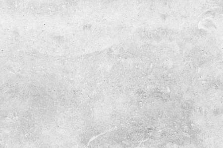 White grey concrete texture, Rough cement stone wall, Surface of old and dirty outdoor building wall, Abstract nature seamless backgroundの写真素材