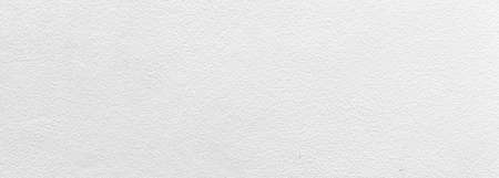 Panorama of New cement wall outside the building, painted white, smooth surface texture and background seamlessの写真素材