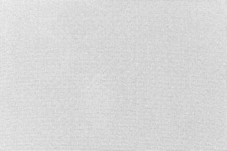 White canvas texture background of cotton burlap natural fabric cloth for wall paper and painting design backdropの写真素材