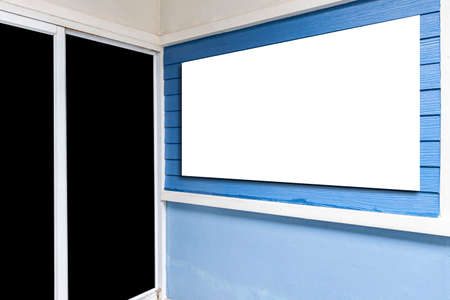 Blank billboards on the wall of the entrance to the buildingの写真素材