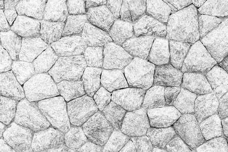 White natural stone wall pattern and background textureの写真素材