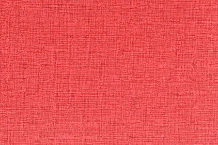 Red canvas texture background of cotton burlap natural fabric cloth for wall paper and painting design backdropの写真素材