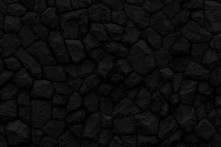 Black natural stone wall pattern and background textureの写真素材