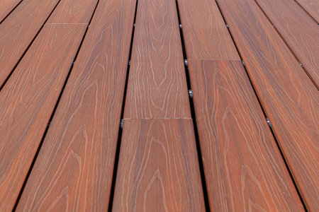 Brown wooden floor on the balcony outside the house pattern and background seamlessの写真素材