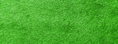 Panorama of New Green Artificial Turf Flooring texture and background seamlessの写真素材