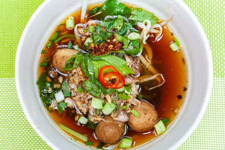 Asian one-dish meal ,Stewed chicken soup with morning glory and bean sproutの写真素材