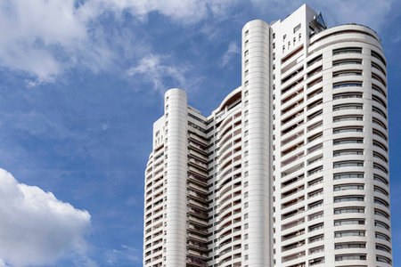 High rise residential buildings and blue skyの写真素材