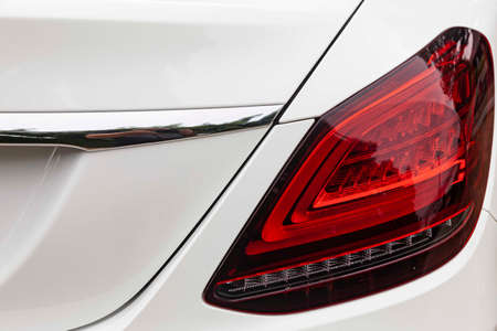 Close - up of white luxury car tail lightsの写真素材