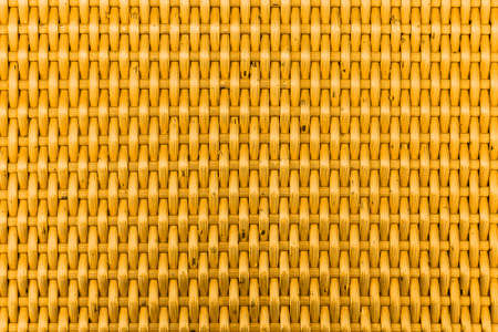 Yellow rattan wooden table top pattern and background seamlessの写真素材