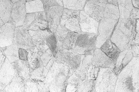 white natural stone wall pattern and background textureの写真素材