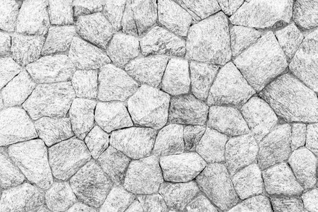 White natural stone wall pattern and background textureの写真素材