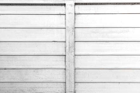 White concrete exterior wall with stripes pattern and texture background seamlessの写真素材