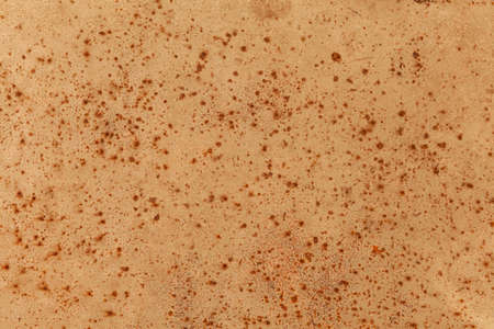 The steel slab is rusty brown with a rough surface texture and background seamlessの写真素材