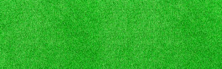 Panorama of New Green Artificial Turf Flooring texture and background seamlessの写真素材