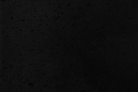 Dark grey black slate background or texture. Black granite slabs backgroundの写真素材