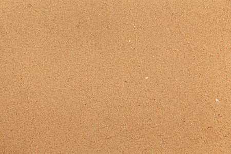 Sand texture. Sandy beach for background. Top view. Natural sand stone texture background. sand on the beach as background. Wavy sand background for summer designsの写真素材