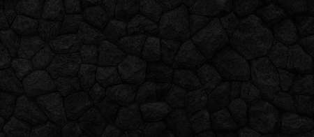 Panorama of Black natural stone wall pattern and background textureの写真素材