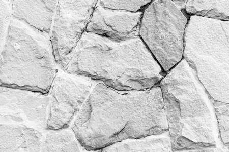 white natural stone wall pattern and background textureの写真素材