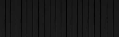 Panorama of Black wood color texture vertical for background. Surface light clean of table top view. Natural patterns for design art work and interior or exteriorの写真素材
