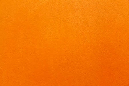 Yellow painted concrete wall in vintage style texture and background seamlessの写真素材