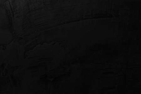 Dark grey black slate background or texture. Black granite slabs backgroundの写真素材