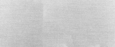 Panorama of White canvas texture background of cotton burlap natural fabric cloth for wall paper and painting design backdropの写真素材