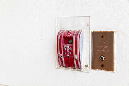 Fire alarm switch on the cement wallの写真素材