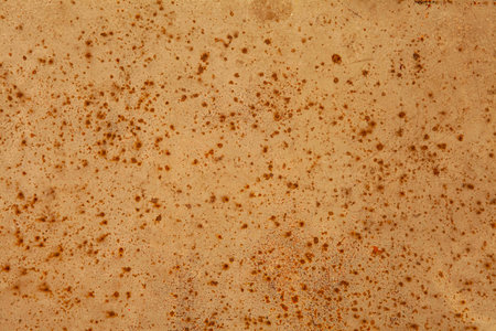 The steel slab is rusty brown with a rough surface texture and background seamlessの写真素材