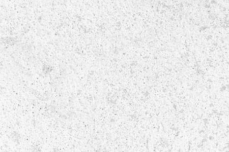 White natural stone wall pattern and background textureの写真素材