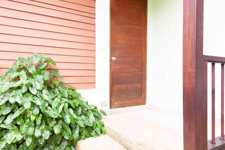 A wide concrete floor balcony in front of the house.の写真素材