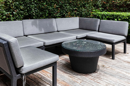 Black wooden chairs and gray cushions on outdoor the living room