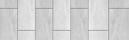 Panorama of Wood grain white ceramic floor tile pattern and texture background seamlessの写真素材