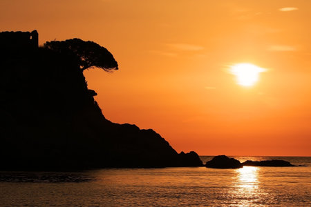 photograph of sunrise over the bay fosca, Palamos, Girona