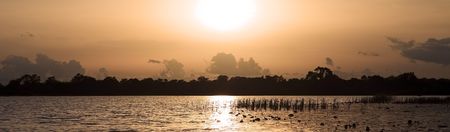 Panoramic sunset on Lake Tengrela, Burkina Fasoの写真素材