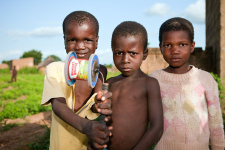 Country Bissa, Burkina Faso - August 9, 2009: Bissa ethnic children are toys, in the absence of economic resources, children of ethnic Bissa make their own toys, のeditorial素材