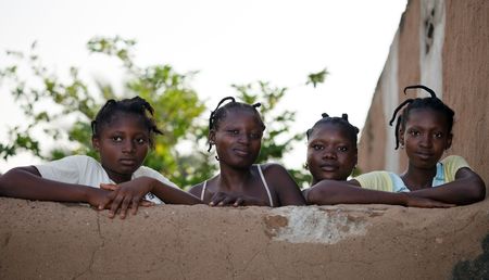 Country Bissa, Burkina Faso - August 9, 2009: Girls posing Bissa ethnic group, the girls look Bissa ethnic sympathy with typical Their hairstyles.のeditorial素材