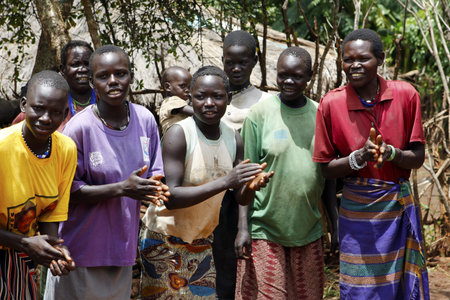 UGANDA-AUGUST 12: Karamojong ethnic women dancing,live in northeastern Uganda, is currently in the...