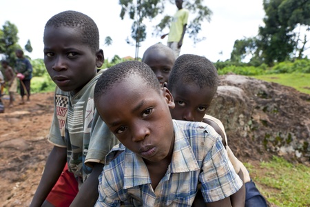 UGANDA-AUGUST 8: Children posing in exchange for a few coins for a living, August 8, 2010 in Kapchorwe District, Ugandaのeditorial素材