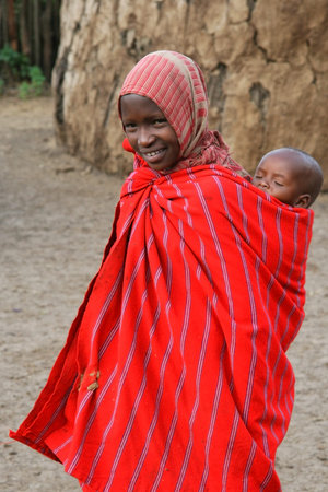 TANZANIA - AUGUST 17: Masai Woman with her son, former warriors who now tend cattle, August 17, 2007 in Ngorongoro, Tanzania のeditorial素材