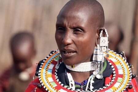TANZANIA - AUGUST 18: Masai woman with their ornaments, women shave their heads differ from men only by their ornaments, August 18, 2007 in Ngorongoro, Tanzania のeditorial素材