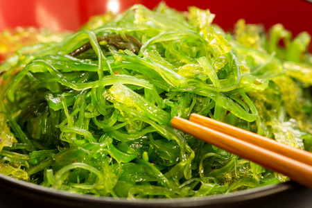 Seaweed salad chopsticksの写真素材