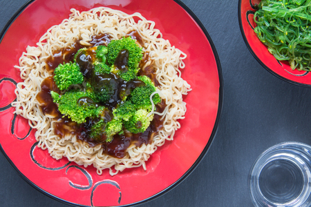Broccoli with Mie Noodles oystersauce and alga salad 03の写真素材