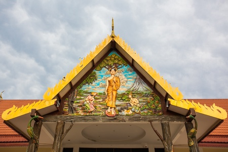 Thai art gold painting on church wood door Bangkok Thailandの写真素材