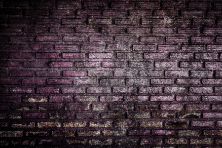 Purple grunge brick wall backgroundの写真素材
